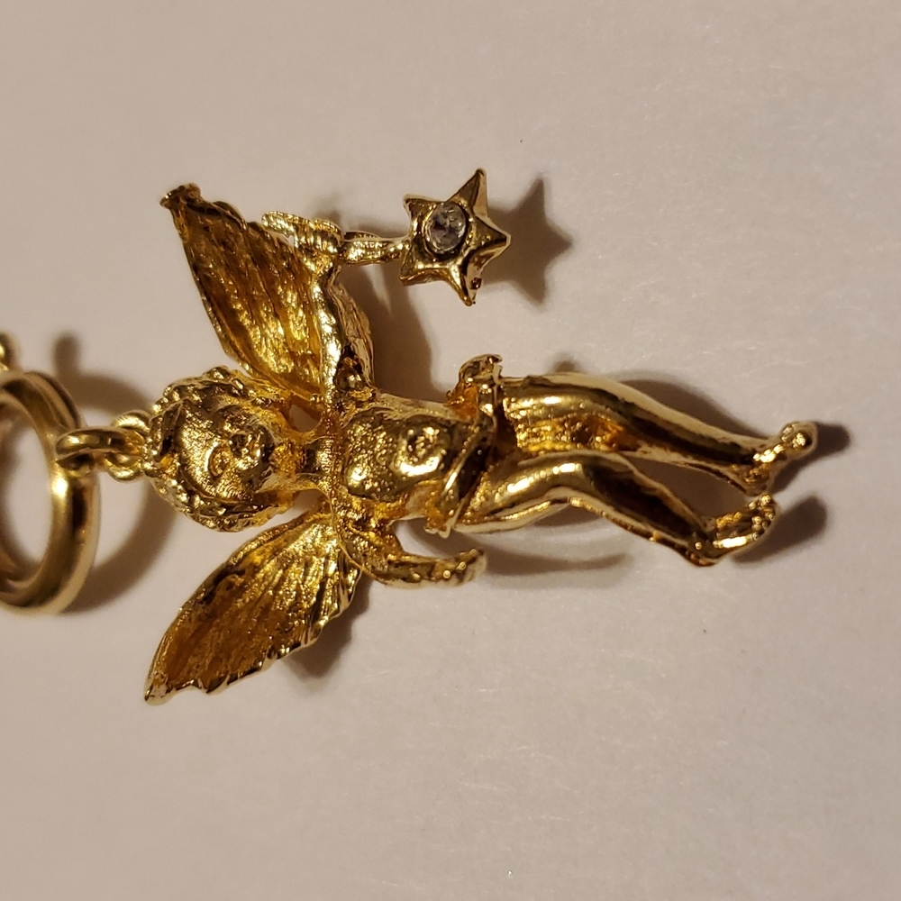 KIRK'S FOLLY Charm, Goldtone, EUC, 3" drop,stamped back star, secure clasp 1"